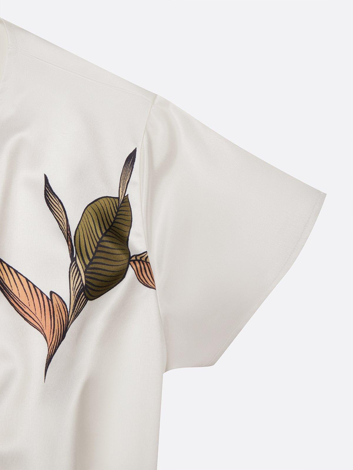 Serenella – Elegancka sukienka kopertowa w liście